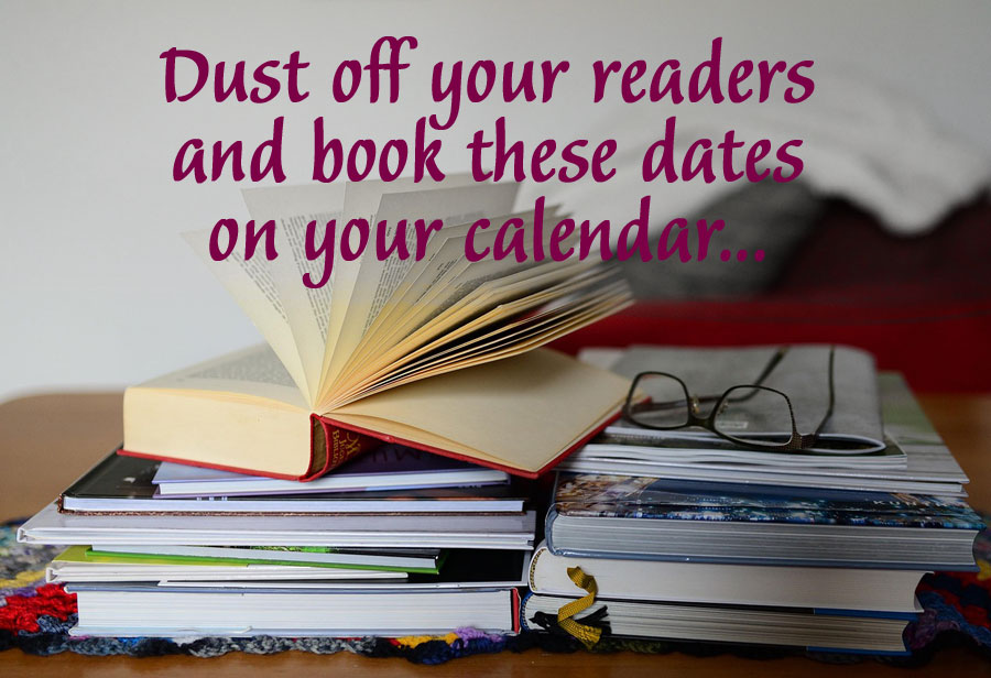 pile of books with reading glasses